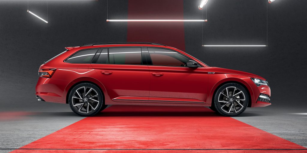 Red SKODA Superb Sportline wagon side