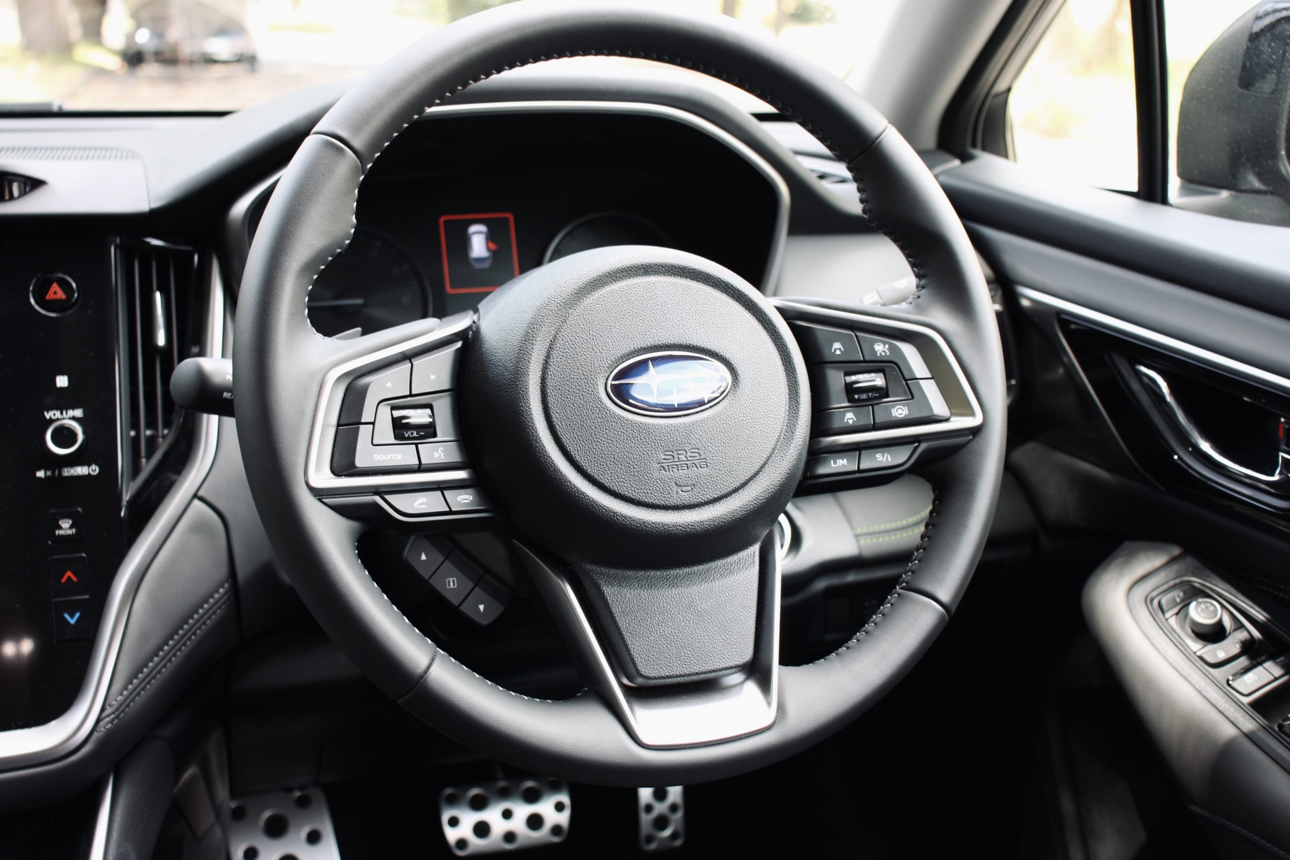 Leather-wrapped steering wheel